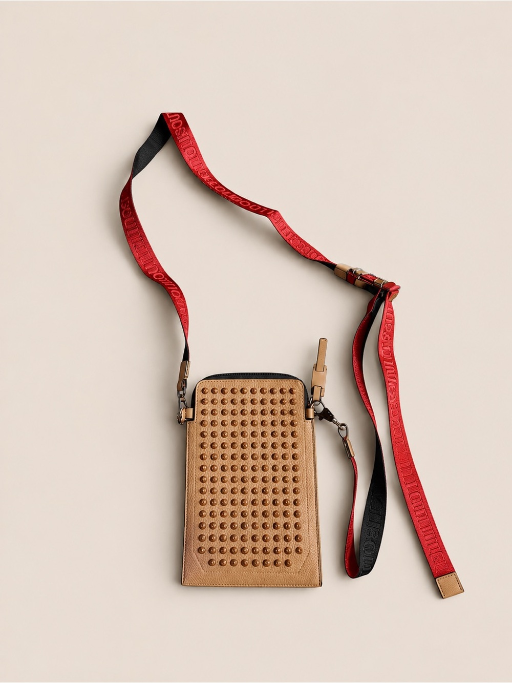 Christian Louboutin Cross Body Bag in Tan with Gold Studs, Red/ Black Strap